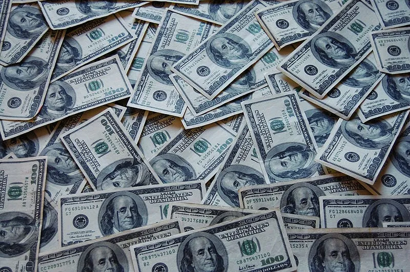 For a Few Unlimited Dollars More. Regulators open the door to unlimited political contributions